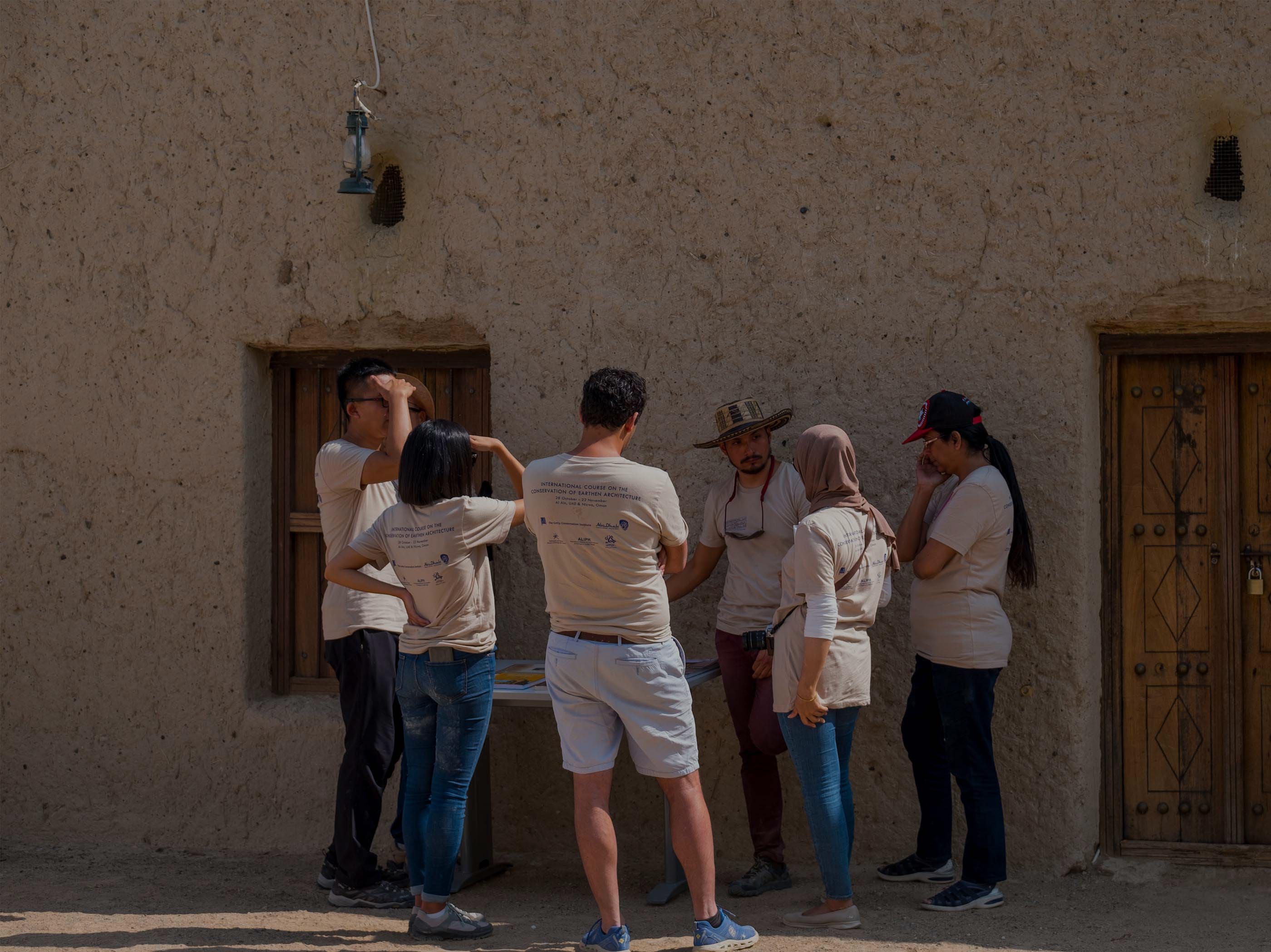 Trainee tourist guides gathered at a heritage site during a field session.